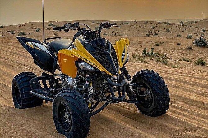 1-Hour Quad Bike Adventure: BBQ Dinner, Sandboarding & Shows! - Reaching the premium desert camp at Al Awir