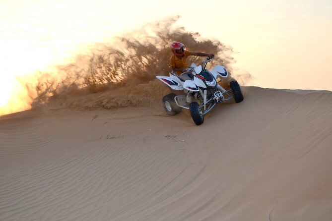 1-Hour Quad Bike Adventure: BBQ Dinner, Sandboarding & Shows! - Sandboarding and the red dunes at Lahbab