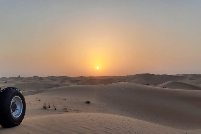 1 hour Quad Biking Experience with pick and drop - Pickup from Sweihan and the ride to the sand