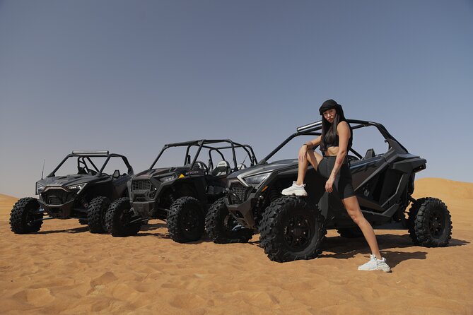2 seater Dune Buggy Safari in Sharjah - Safety briefing, helmet, and buggy setup