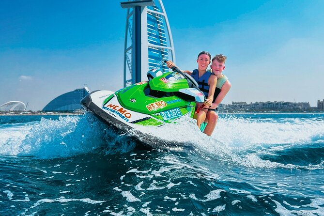 30-Min Jet Ski Tour: English Breakfast, Burj Al Arab View Bliss - Racing across the water toward the Burj Al Arab