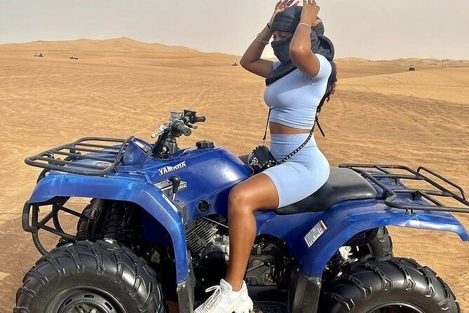 4 Hours Desert Tour with Quad Bike Camel Ride & Sandboard - Sunset photos and the human side of the tour
