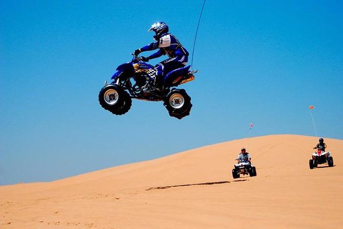 4x4 Deluxe Desert Safari Dubai with Camel Riding - High dunes, sandboarding, and sunset photographs