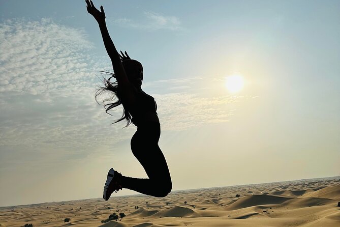 Abu Dhabi: 4x4 Desert Safari and Sandboarding. - Sandboarding at the traditional camp