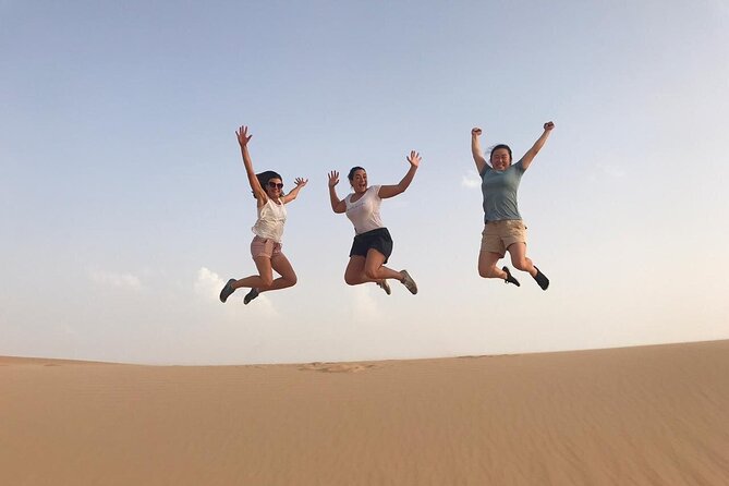 Abu Dhabi: 7-Hours Desert Safari with BBQ, Camel Ride & Sandboarding - Sunset photos and the camel farm visit