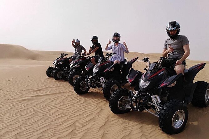 Abu Dhabi Desert Safari BBQ Dinner Live Shows Pick & Drop More - Sunset, Sandboarding, and the Short Camel Ride