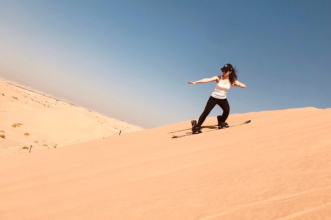 Abu Dhabi Desert safari with BBQ Dinner,Sandboarding & Camel ride - Leaving Abu Dhabi for the open desert