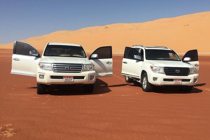 Abu Dhabi Desert Safari with BBQ Dinner & Shows - The red dunes and sunset provide the evening’s best views