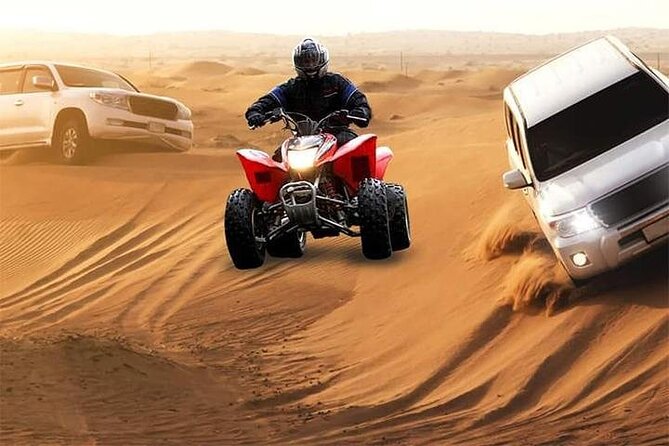 Abu Dhabi Evening Desert Safari Adventure - Riding over the dunes in a shared Land Cruiser