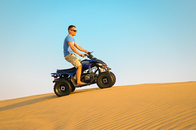 Abu Dhabi Evening Desert Safari - Dune bashing Camel ride and BBQ - Setting up the Land Cruiser for the dunes