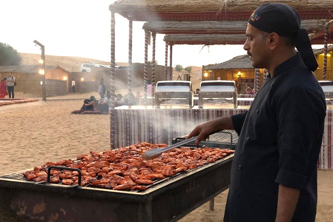 Abu Dhabi Evening Desert Safari with BBQ Dinner and all Camp Activities - BBQ dinner and evening entertainment