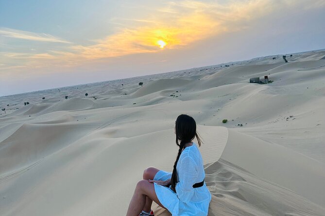 Abu Dhabi: Evening Desert Safari with Camel Ride, BBQ & Live Show - Sunset from the dunes before camp