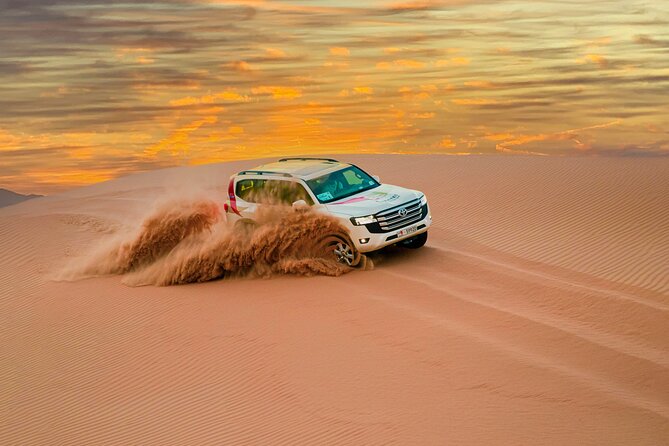 Abu Dhabi Morning Desert Safari: 4x4 Dune Bashing, Camel Ride and Sandboarding - What the Al Khatim Desert setting gives you