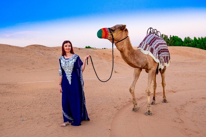 All in one Dubai Desert Safari ATV or Buggy Camelride BBQ Dinner - Thirty minutes of dune bashing and sandboarding