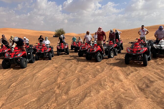 All in one Dubai Desert Safari ATV or Buggy Camelride BBQ Dinner - Sunset photos at Lahbab