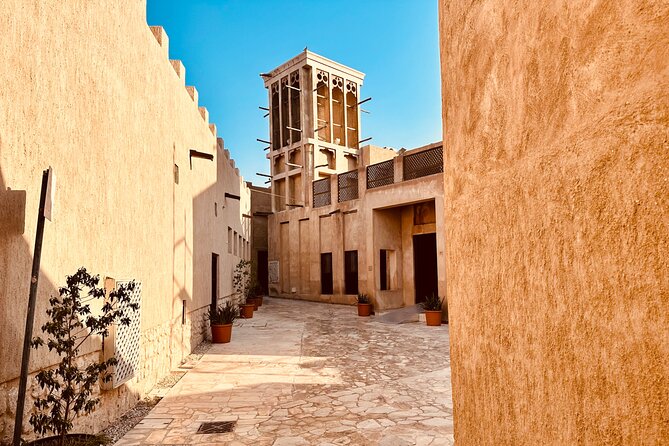 Authentic Old Dubai, Souks, Tastings & local boat Guided Tour - Shopping through the Old Souk and Spice Souk