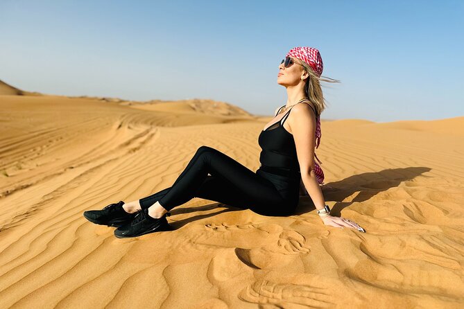Best Dubai Desert Safari with Buffet Dinner,Sand Boarding & Shows - Camel rides, henna, and the Bedouin-style camp