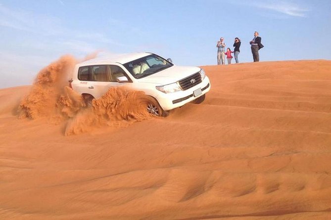 Camel Trekking and Morning Safari with Sand Boarding - Sandboarding From a High Dune