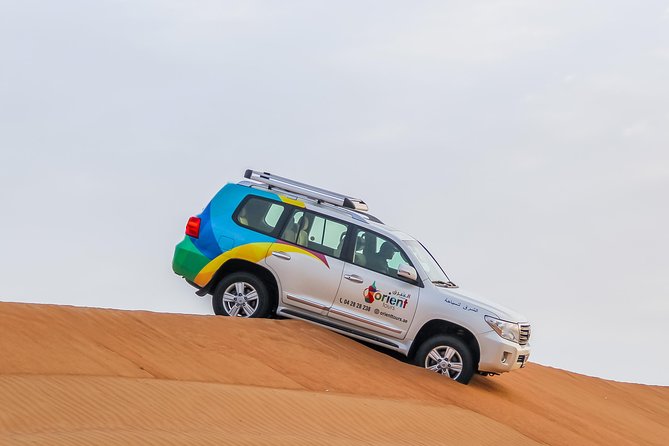 Classic Dubai Desert Safari with BBQ Dinner and Camp activities - Twenty minutes of dune bashing near Lahbab