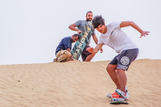 Classic Dubai Desert Safari with BBQ Dinner and Camp activities - Heat, clothing, and physical effort