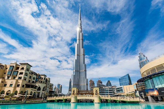 Classical Dubai City Tour with guide and sharing transfers - Crossing Dubai Creek by abra