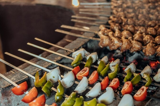 Deluxe Sunset Desert Safari: SandSurfing, Camel Ride & BBQ dinner - Fire, Tanoura, and belly-dance performances