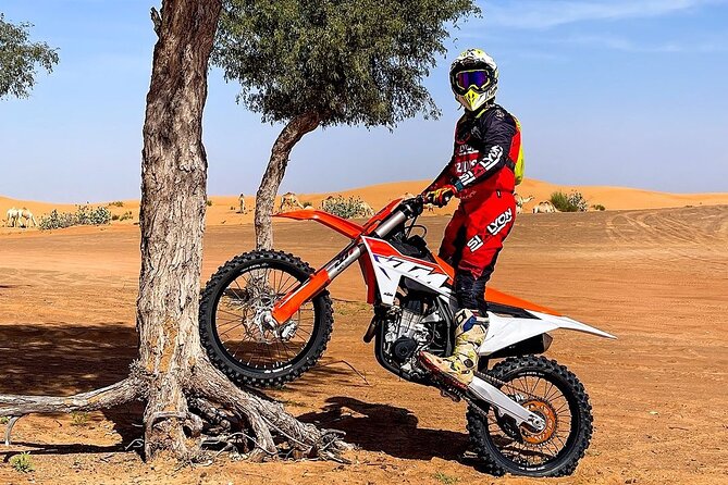 Desert Motorbike Tour in Dubai - Getting fitted with a bike and safety gear