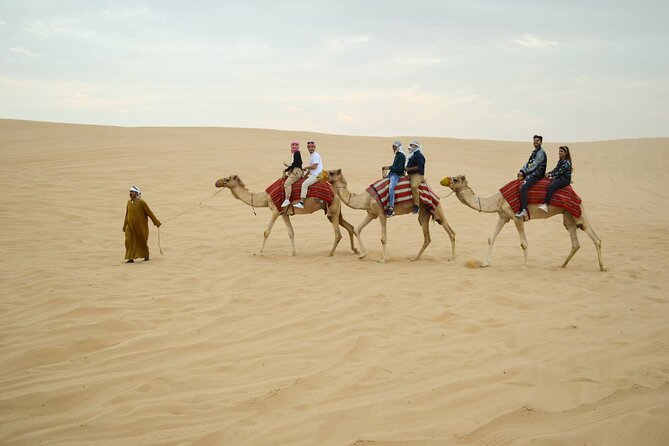Desert Quad Biking Tour and Sand Boarding with Dinner in Dubai - Quad Biking and Sandboarding at Lahbab
