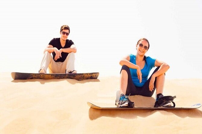 Desert Safari and Quad Bike Experience in Dubai with Dinner - Sandboarding and the camel ride slow things down