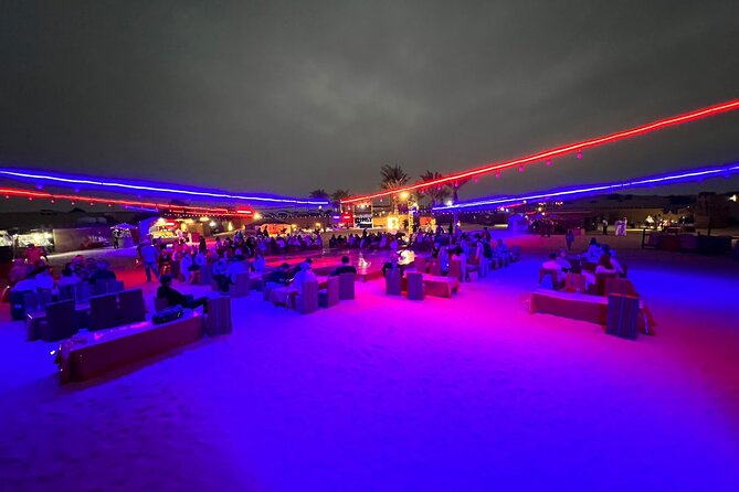 Desert Safari and Sandboarding with Dinner in Dubai - Camel riding, costumes, and camp activities