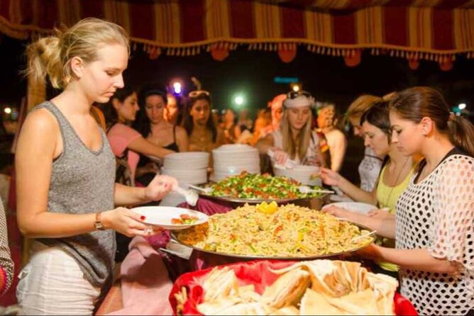 Desert Safari BBQ dinner, Camel ride & sandboarding from Dubai - Lahbab: Where the Dune Bash Takes Center Stage