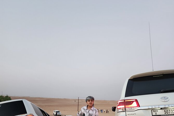 Desert Safari BBQ Dinner, Live Shows, ATV Bikes, Sandboarding - Sandboarding offers a quieter kind of fun