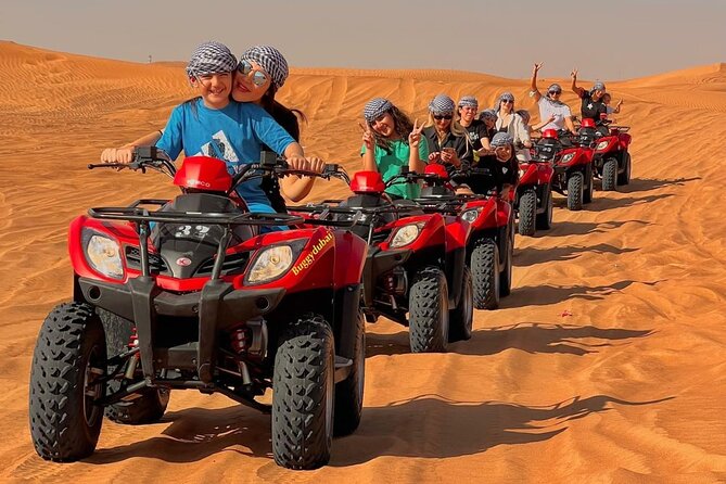 Desert Safari Dubai 25 minutes Quad Bike Free Camel Ride BBQ Dinner - Camel riding and sandboarding