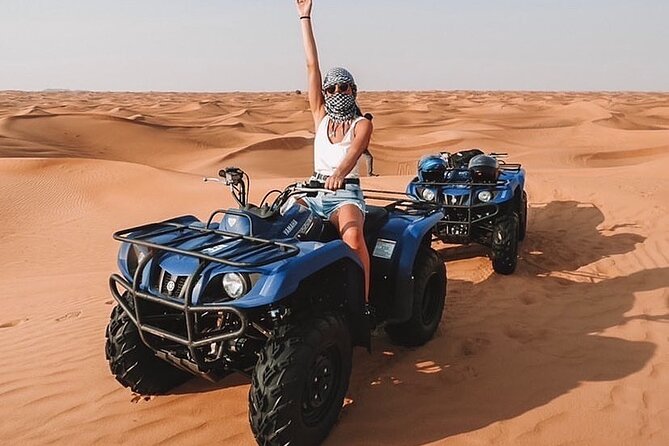 Desert Safari Dubai 25 minutes Quad Bike Free Camel Ride BBQ Dinner - What the $95 price really buys