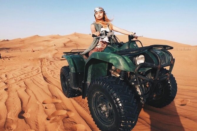 Desert Safari Dubai 25 minutes Quad Bike Free Camel Ride BBQ Dinner - Thirty minutes of dune bashing in a Land Cruiser