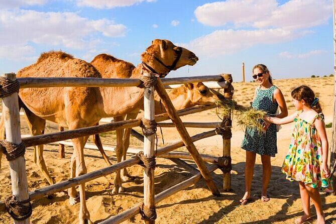 Desert Safari Dubai 30 Mins Quad Bike, Sand Board, Camel Ride BBQ - Camel riding, coffee, henna, and Arabic dress