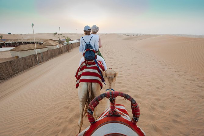 Desert Safari Dubai Adventure With BBQ & Live Shows - Camel rides and sand boarding