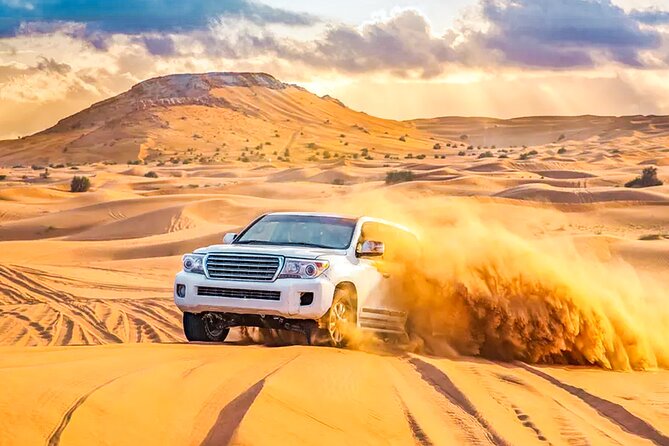 Desert Safari Dubai BBQ Dinner & Live Shows - The big-dune photo stop and sand-boarding