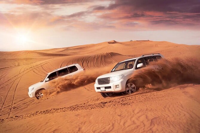 Desert Safari Dubai Sand Bashing, Camel Ride, Shows, Live BBQ - Sandboarding, henna, and Arabic dress at camp