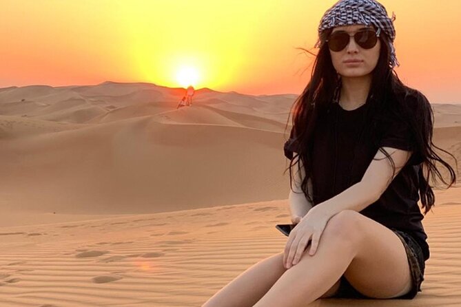 Desert Safari Dubai Tour with Dune Bashing, Camel Ride, & BBQ - Open-dune quad biking at the first desert stop