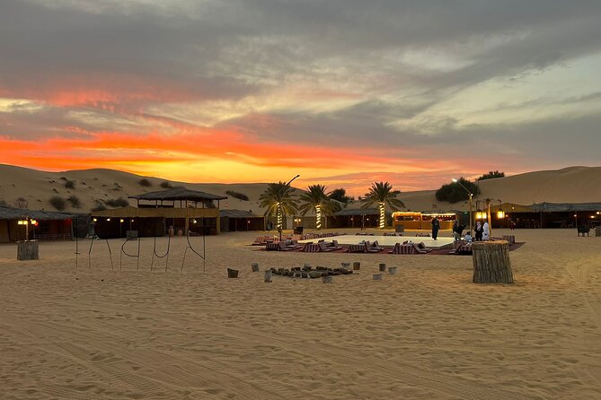 Desert safari Dubai with BBQ Dinner - Sandboarding from the high dunes