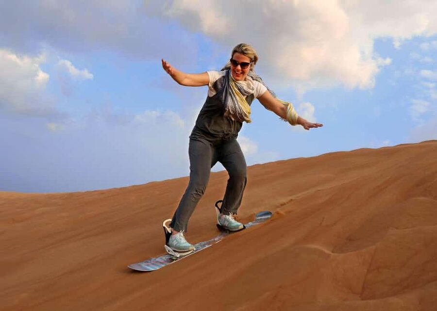 Desert Safari Dubai with Camel Ride, Sandboarding & Dinner - Al Aweer Camp, BBQ Dinner and Evening Entertainment