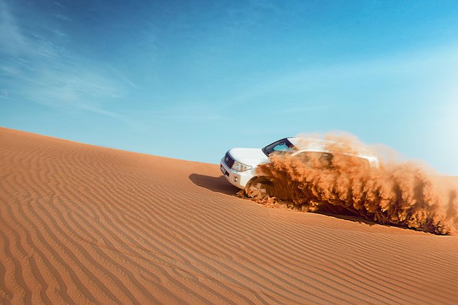 Desert Safari Dubai with Dune Bashing, Sandboarding, Camel Ride, 5 Shows, Dinner - What the six-hour Dubai desert safari is really like