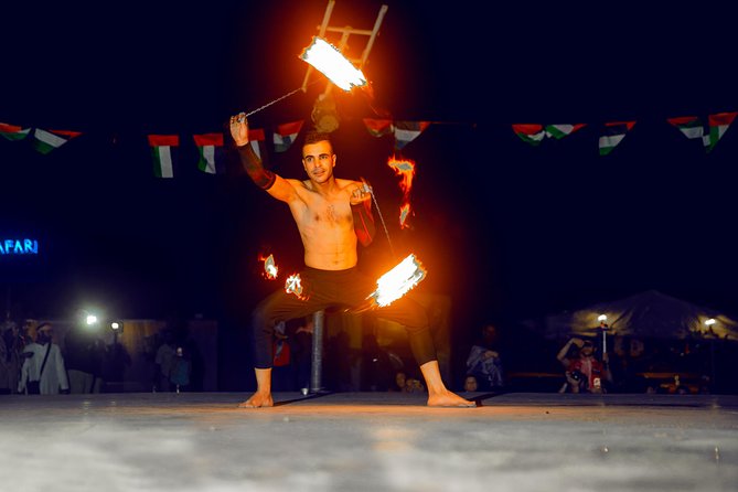 Desert Safari Dubai with Dune Bashing, Sandboarding, Camel Ride, 5 Shows, Dinner - Dinner and live shows make the evening feel complete