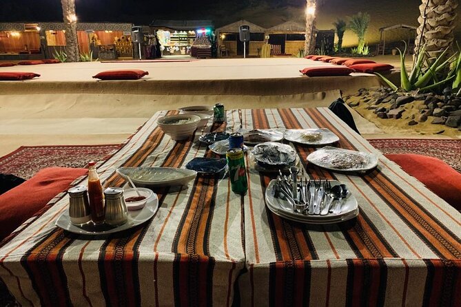 Desert Safari Experience with Dune Bashing and Dinner in Dubai - A camel farm and a closer look at falcons