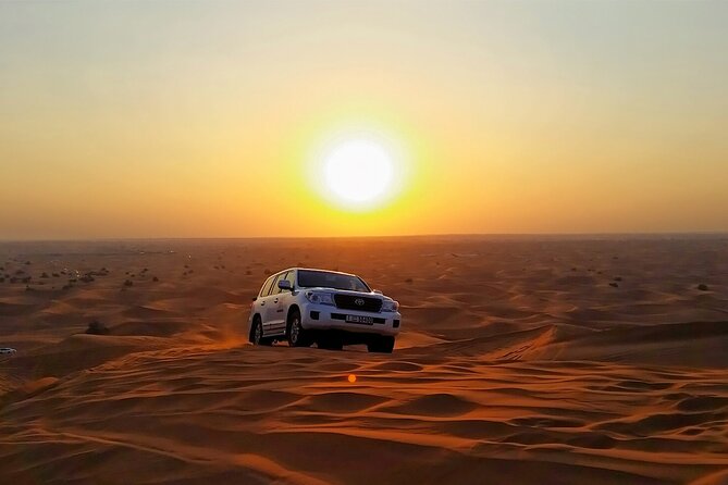 Desert Safari in 4x4 Car with BBQ Dinner and Belly Dance - BBQ dinner, unlimited soft drinks, and camp seating