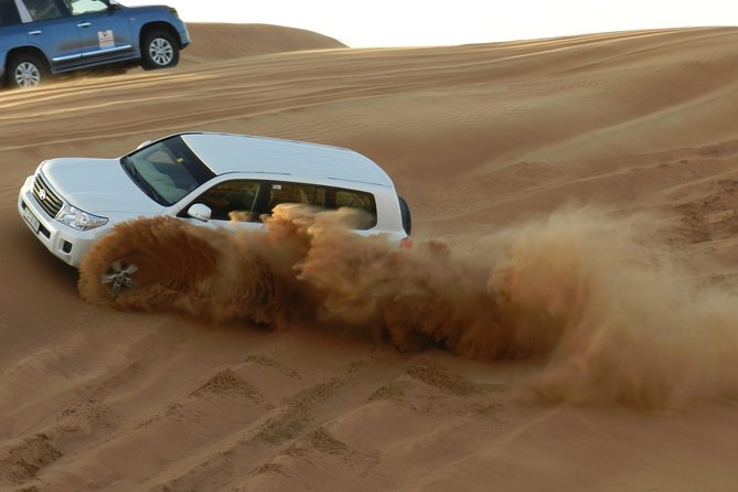 Desert safari in Dubai Red Dunes with BBQ VEG Dinner & Quad Bike - From Dubai hotel to Lahbab’s red dunes