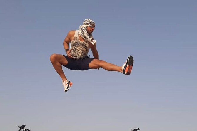 Desert safari in Dubai With BBQ Buffet Dinner Live Entertainments - Belly dancing, fire, and tanoura keep the evening moving