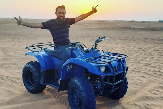 Desert Safari, Quad Biking, Sand Surfing and BBQ Dinner In Dubai - Sandboarding, dune photos, and the sunset pause
