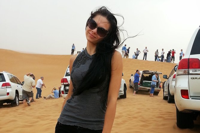 Desert Safari Tour - FULL PROGRAM with Dinner Show and more... - Sunset, sandboarding, and camels at Al Madam
